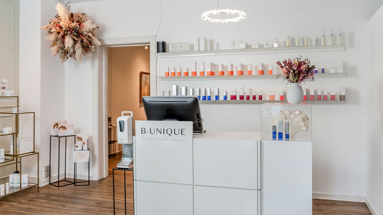 Hudplejeklinikken B. Unique baggrunds billede